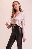 BLUSA SATINADA MOÑOS